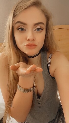 Blow_kiss_to_camera_(1)